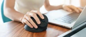 woman hand using computer ergonomic mouse